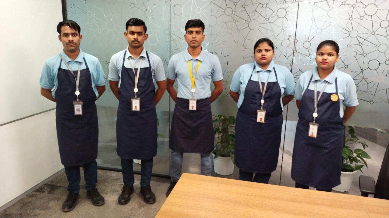 The uniformed 360 Cristals facilities care team